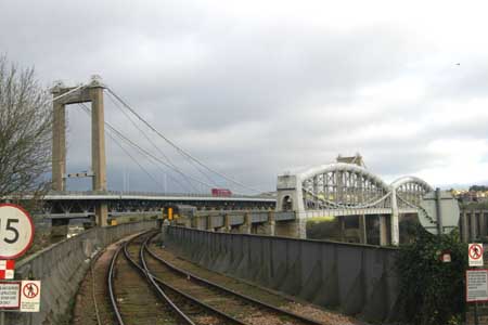 The Royal Albert Railway Bridge with diesel multiple unit, taken from the Saltash station, 31st January 2005 by Kevin Hale.